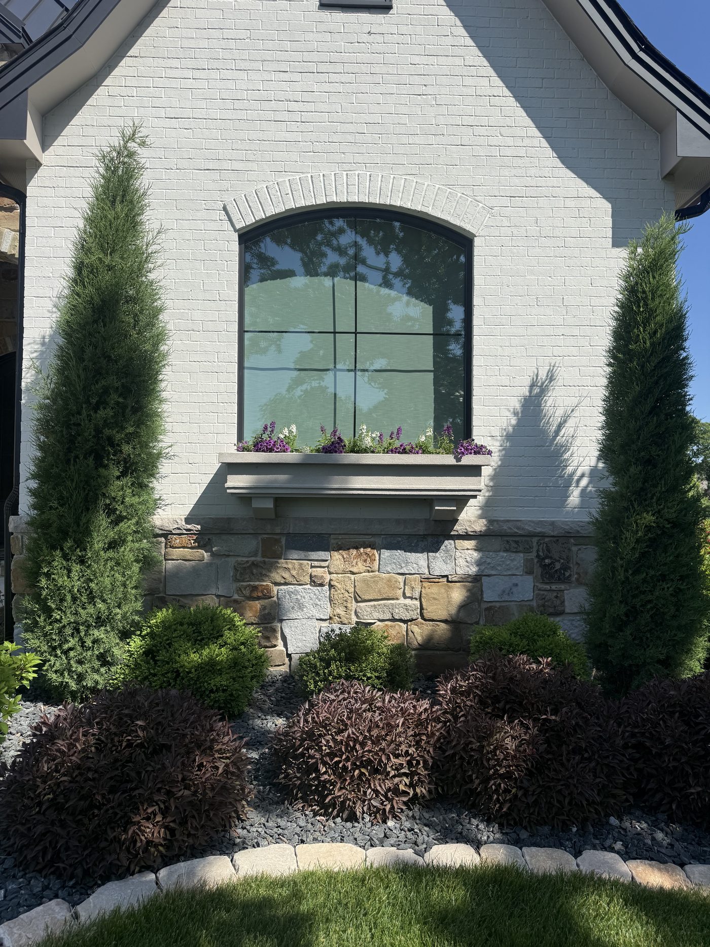 Window Cleaning — Arched feature window by JBL Exterior Pros, central Iowa