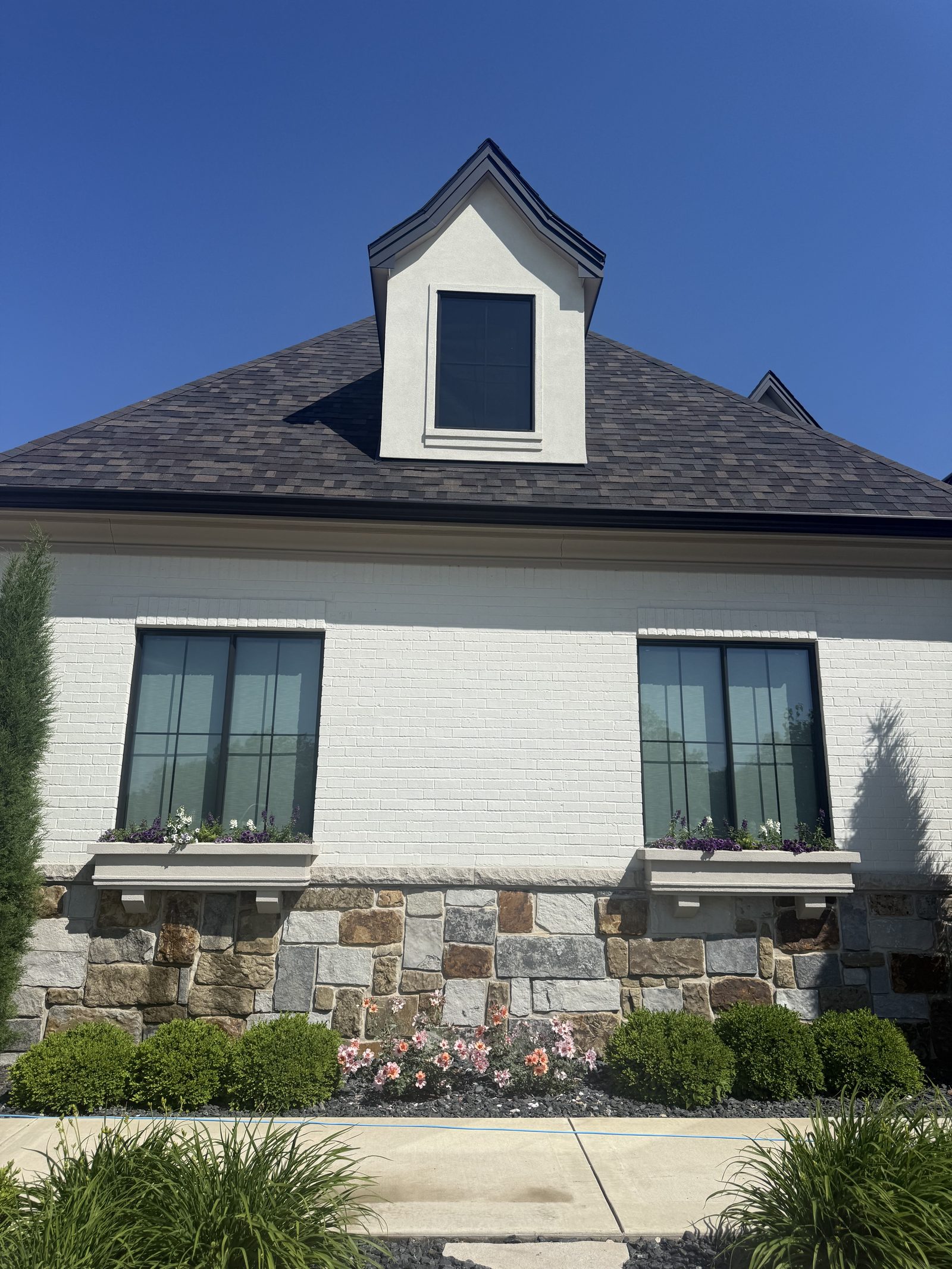 Soft Washing — White luxury home by JBL Exterior Pros, central Iowa