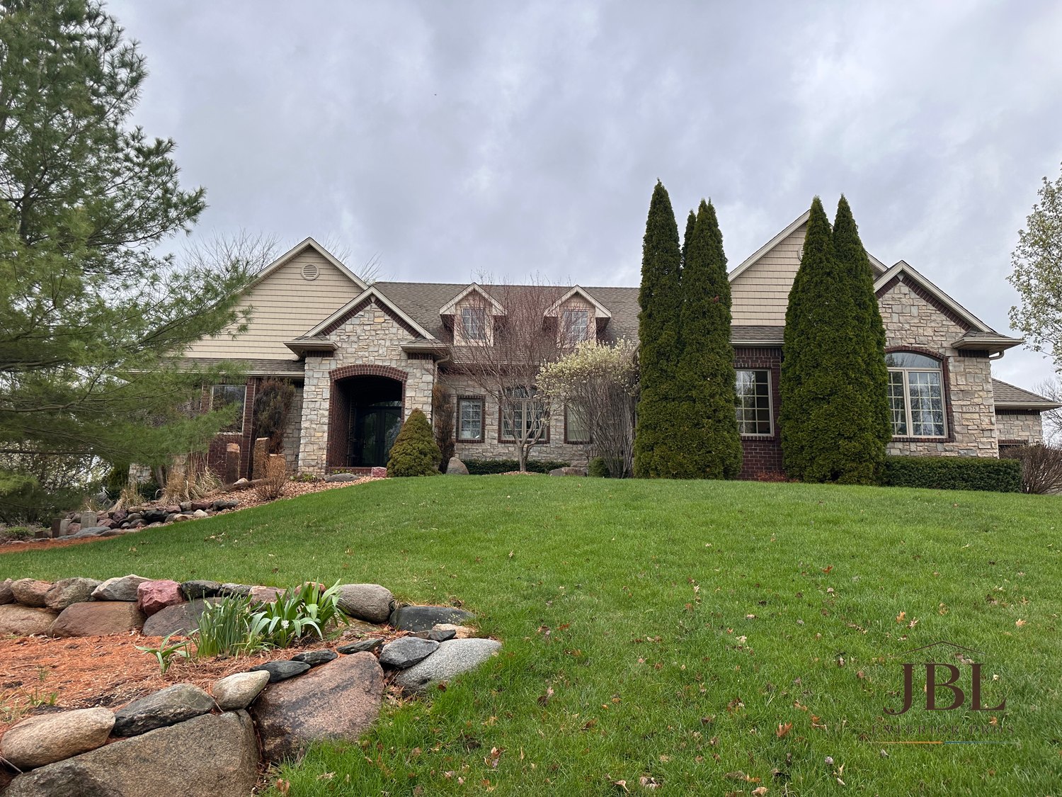 Stone-and-shake estate, exterior cleaned by JBL